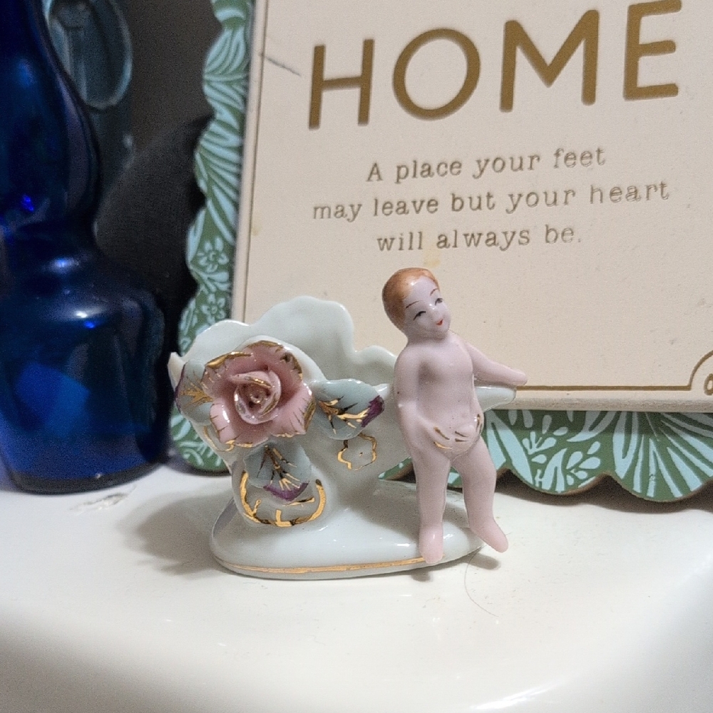 Porcelain Figurine with Pink Rose